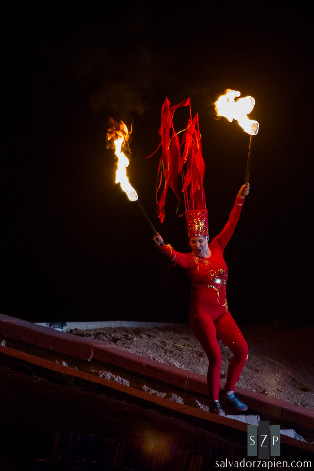 The lone fire dancer taunts Old Man Gloom with fire.